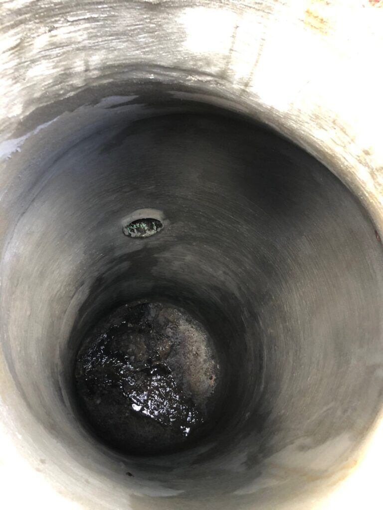 Manhole treated with PrimeLiner Epoxy Mortar